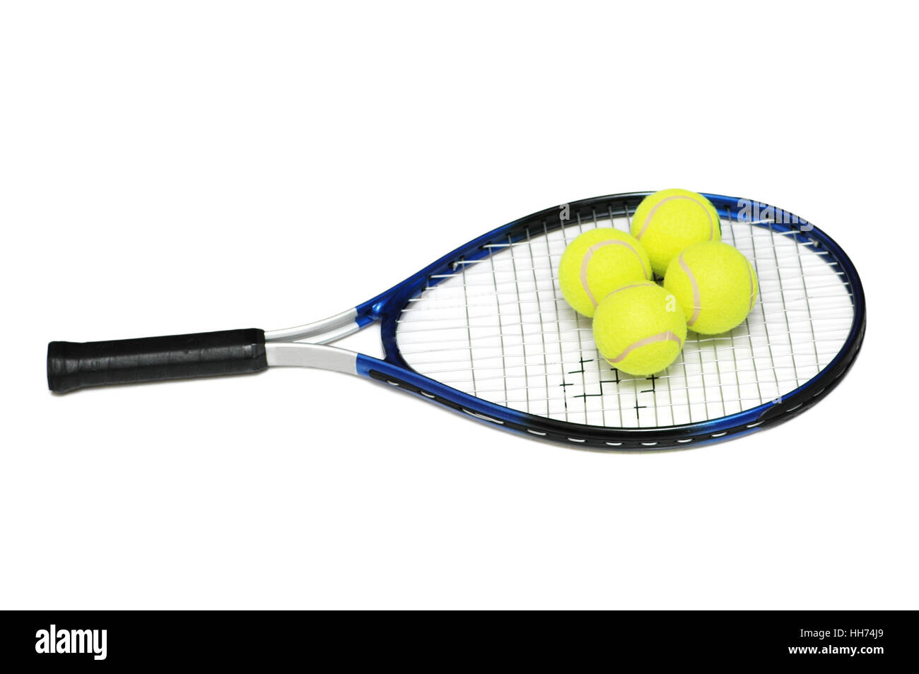 Tennis rackets and four balls isolated on white Stock Photo - Alamy