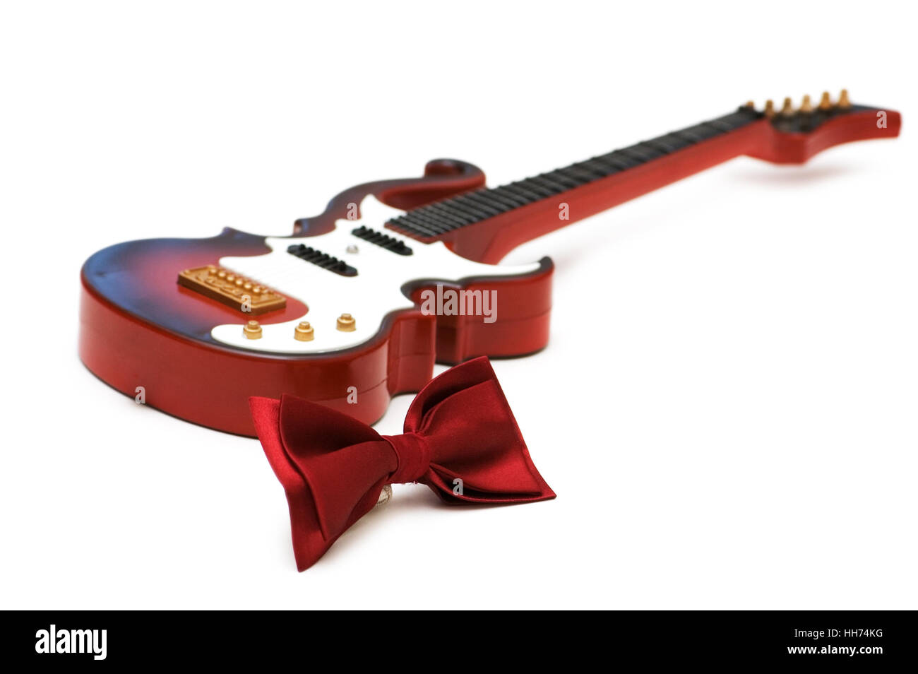 Bow tie and guitar isolated on white Stock Photo Alamy