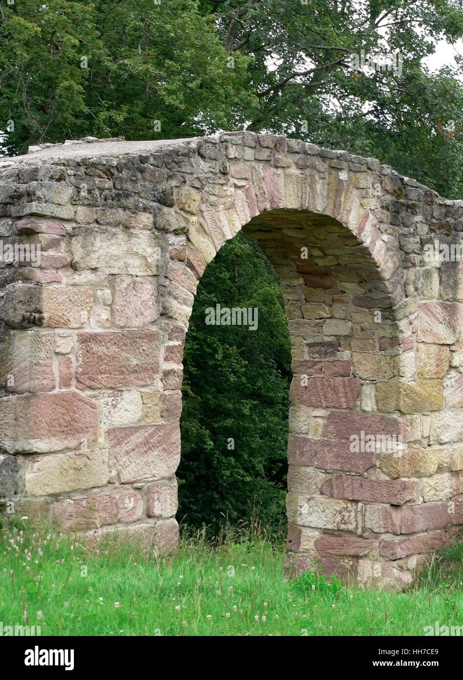 old masoned archway in a castle ruin in Germany at summer time Stock Photo