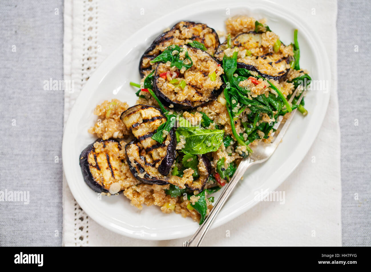 Salad with roast eggplant and quinoa Stock Photo Alamy