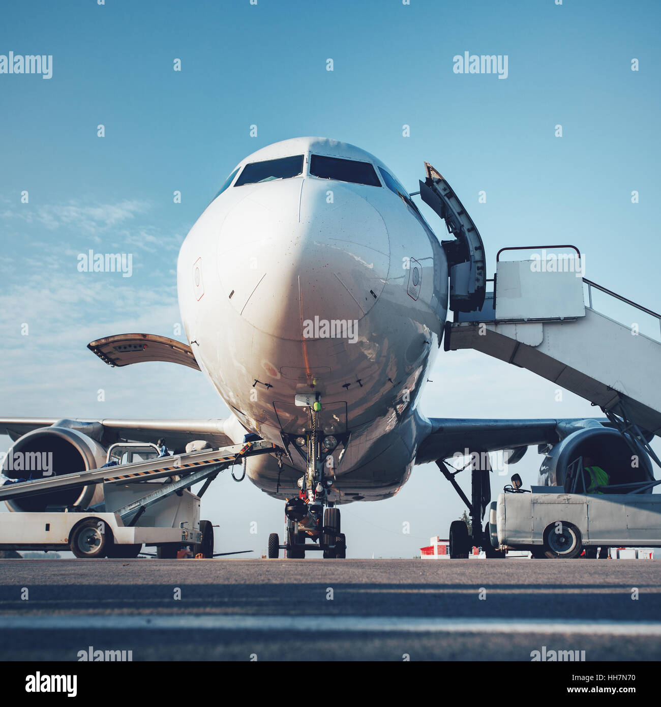 Preflight service, aircraft maintenance, baggage is loading into the