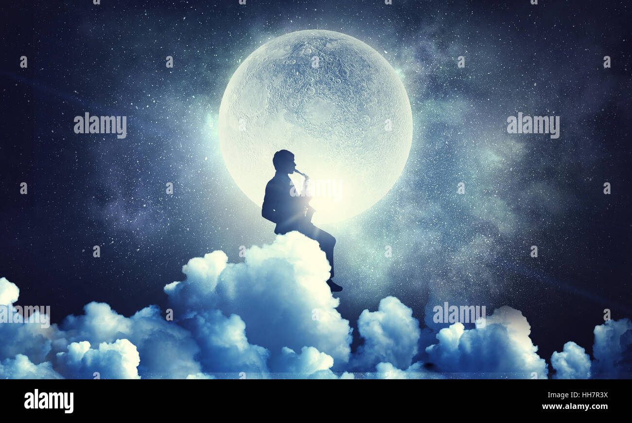 Man playing saxophone against full moon background Stock Photo - Alamy Man playing saxophone against full moon background Stock Photo - Alamy