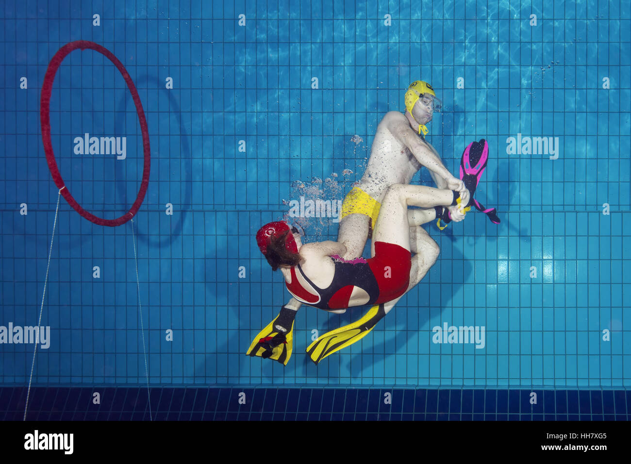 Underwater wrestling (Aquathlon) in swimming pool. Underwater view Stock Photo Alamy