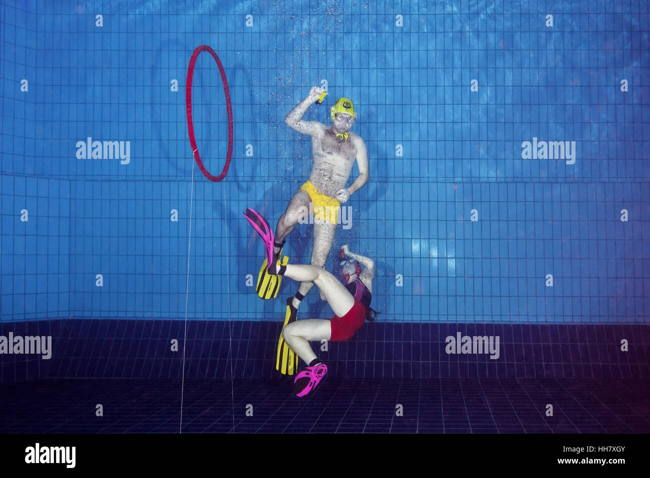 Underwater wrestling (Aquathlon) in swimming pool. Underwater view