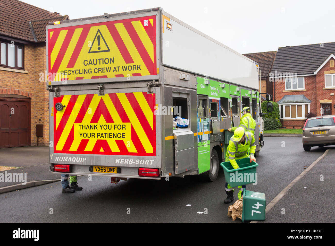 Plastics recycle bin worker High Resolution Stock Photography and
