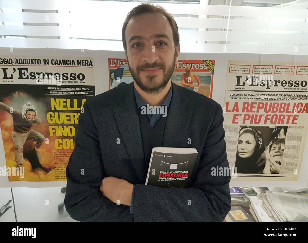 Rome, Italy. 16th Jan, 2017. The Italian investigative journalist Emiliano Fittipaldi poses with his new book 'Lussuria', a study of child abuse in the Catholic Church, in Rome. Photo: Stefania Fumo/dpa/Alamy Live News Stock Photo