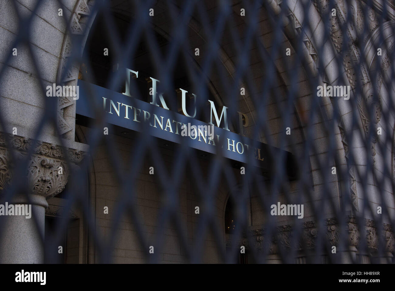 Washington DC, USA. 18th January 2017. The Trump International Hotel, recently opened along the Inaugural parade route, is seen behind protective fencing, Wednesday, January 18, 2017. Credit: Michael Candelori/Alamy Live News Stock Photo
