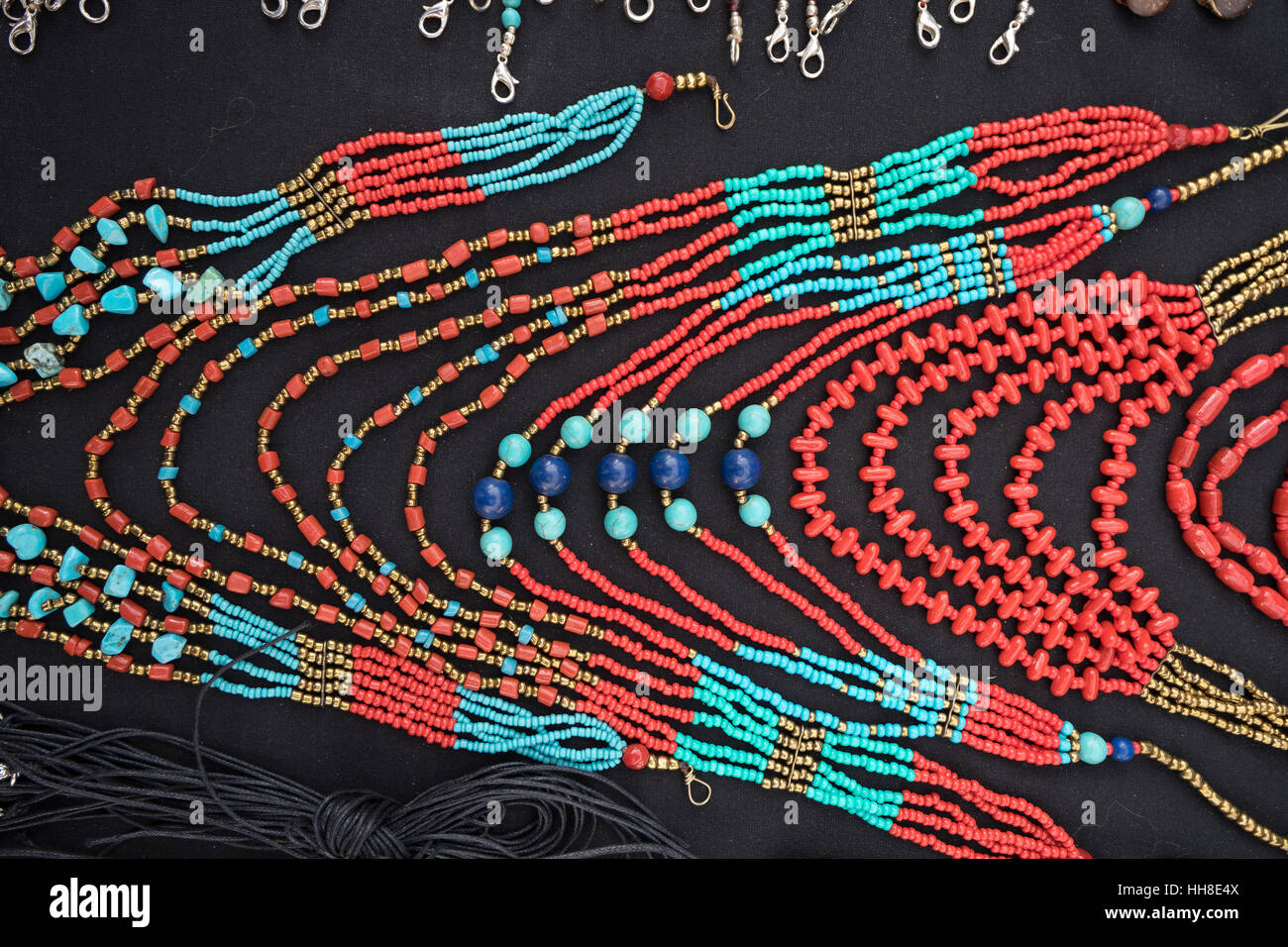 colourful beaded jewelery closeup in Otavalo market Ecuador Stock Photo