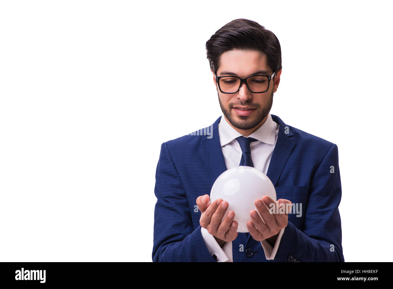 Businessman with crystall ball isolated on white background Stock Photo ...