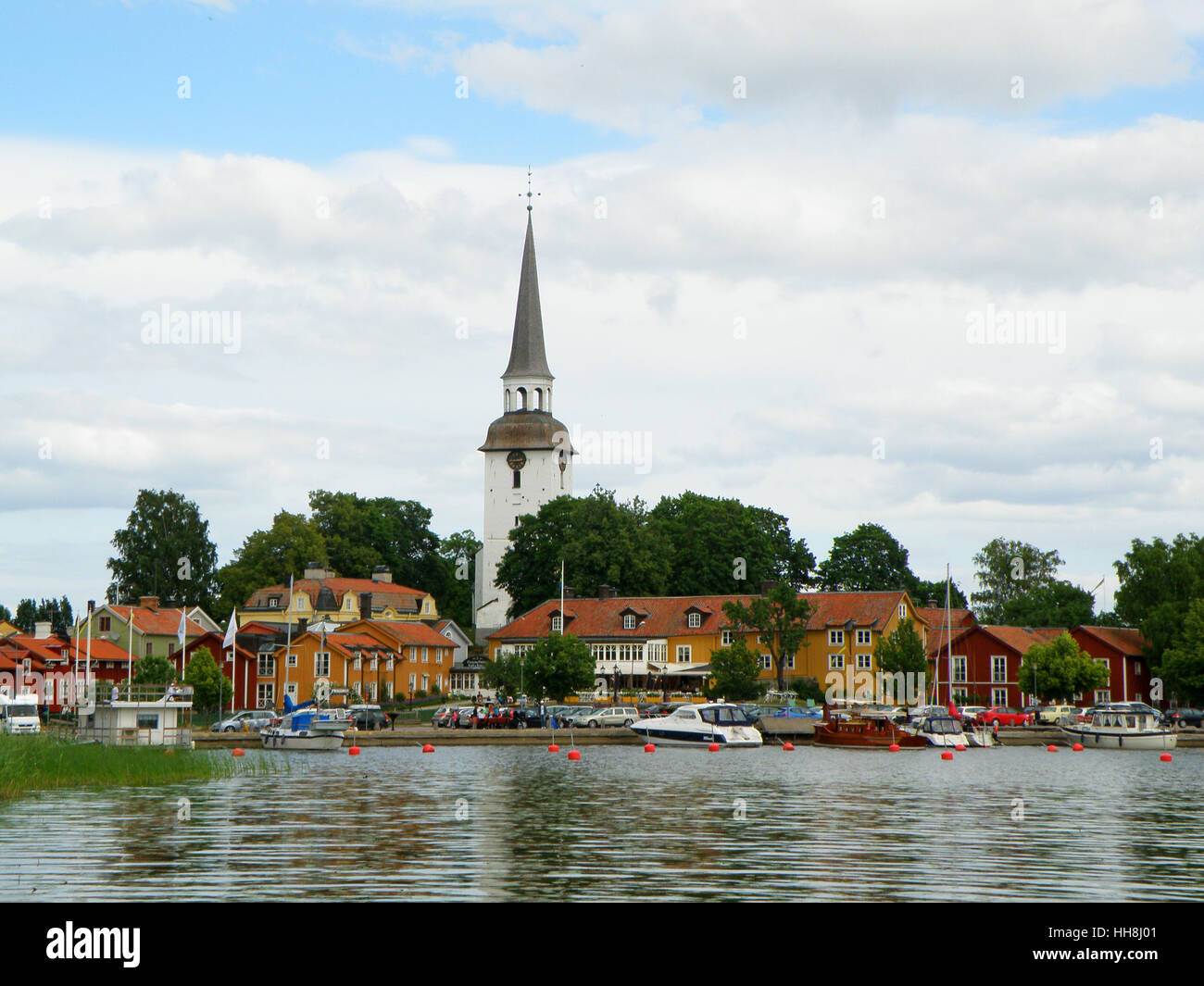 The picturesque Mariefred town with Karnbo church by the lake Malaren, Sweden Stock Photo