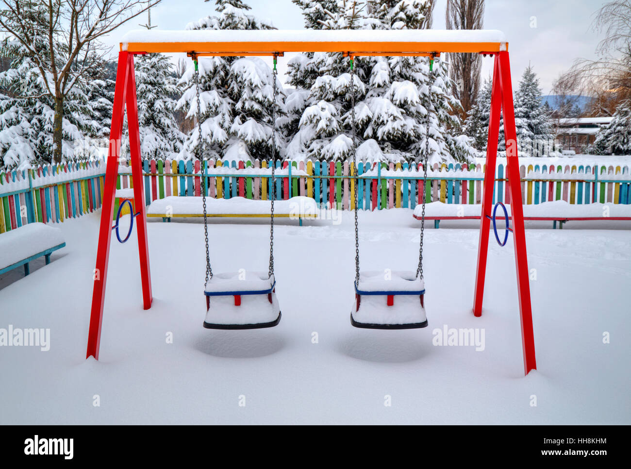 Children's playground covered with snow in winter Stock Photo - Alamy