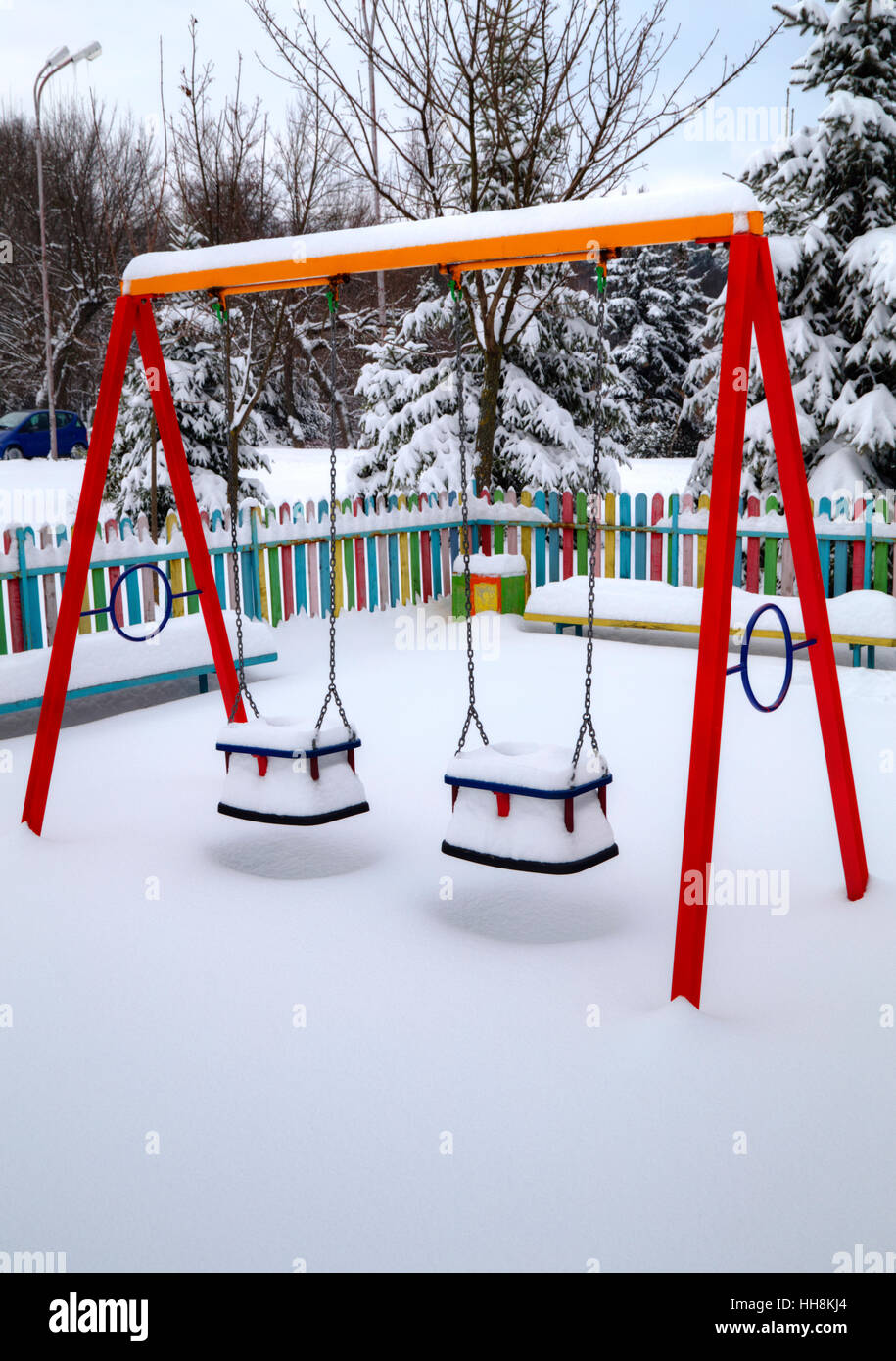 Children's playground covered with snow in winter Stock Photo - Alamy