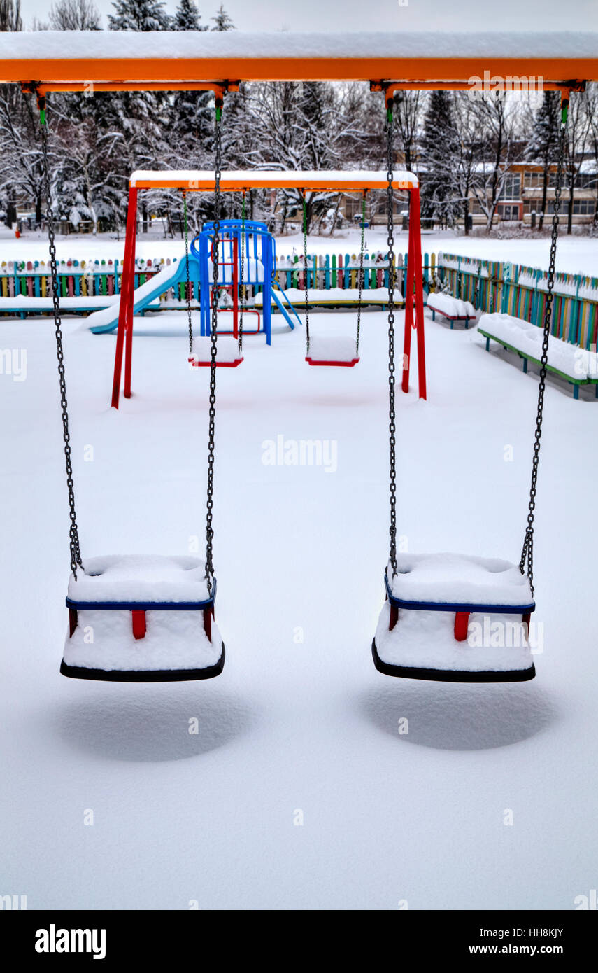 Children's playground covered with snow in winter Stock Photo - Alamy