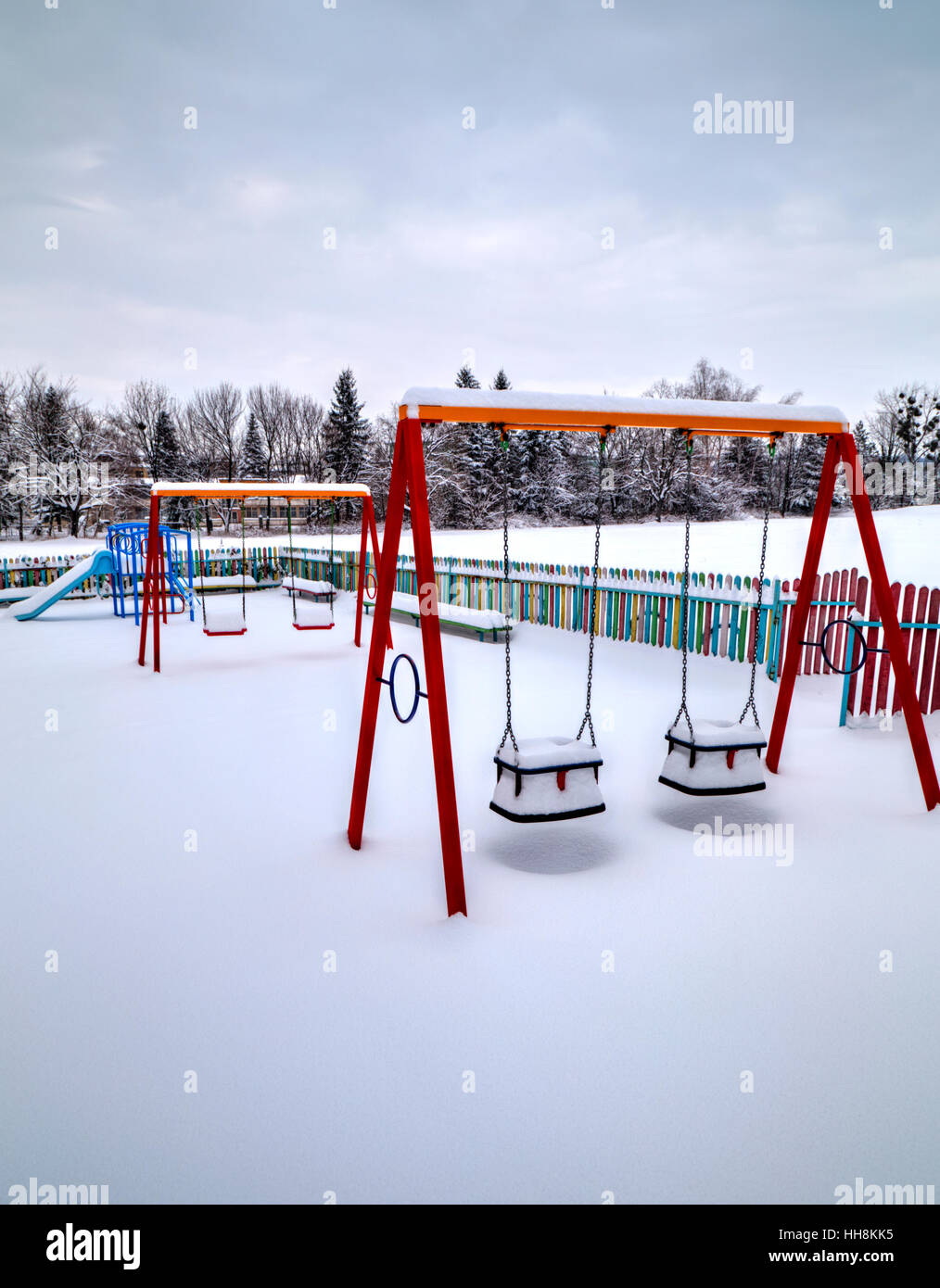 Children's playground covered with snow in winter Stock Photo - Alamy