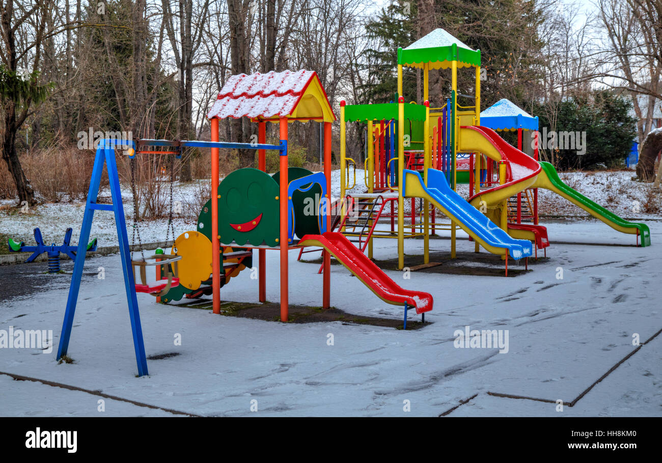 Children's playground covered with snow in winter Stock Photo - Alamy