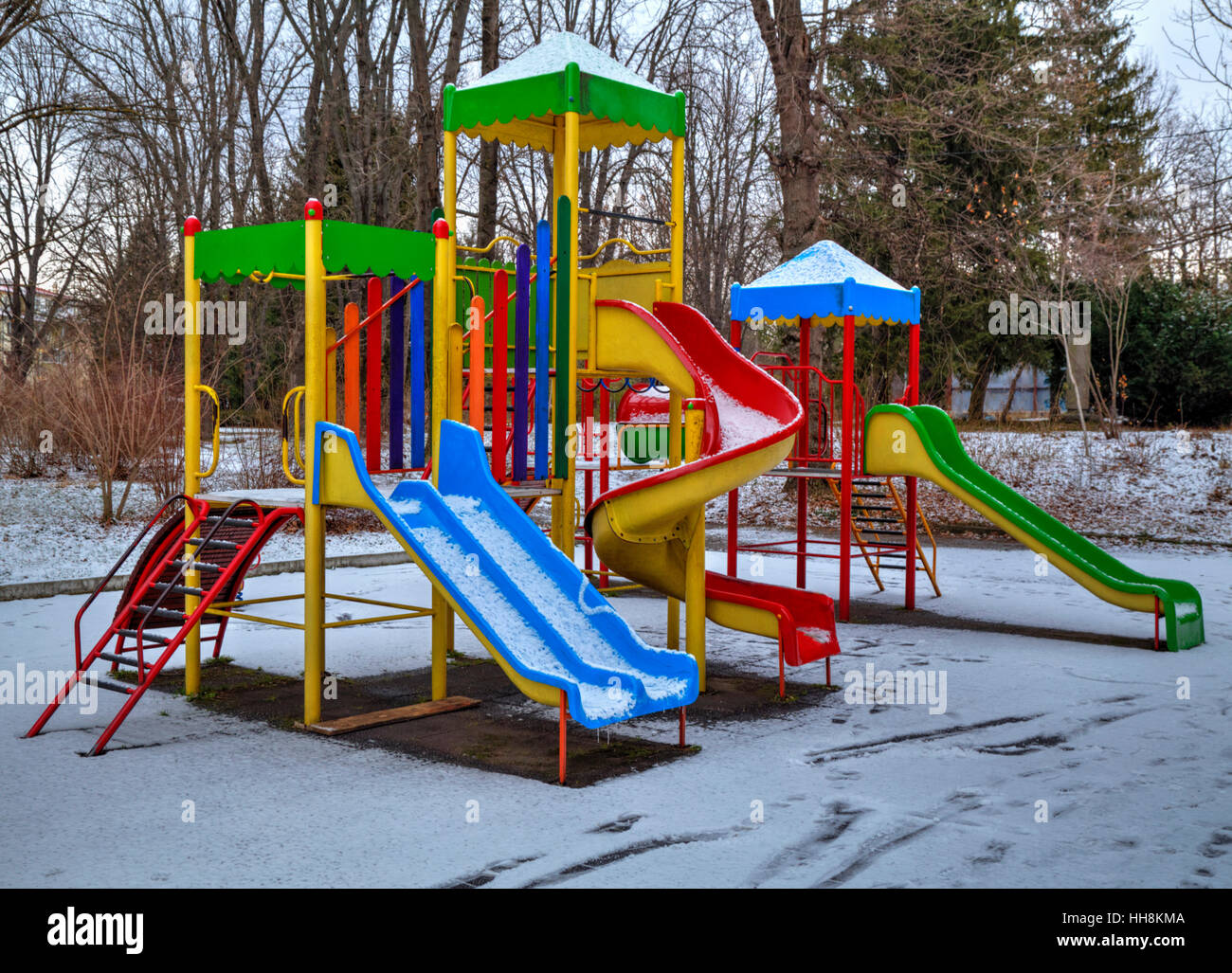 Children's playground covered with snow in winter Stock Photo - Alamy