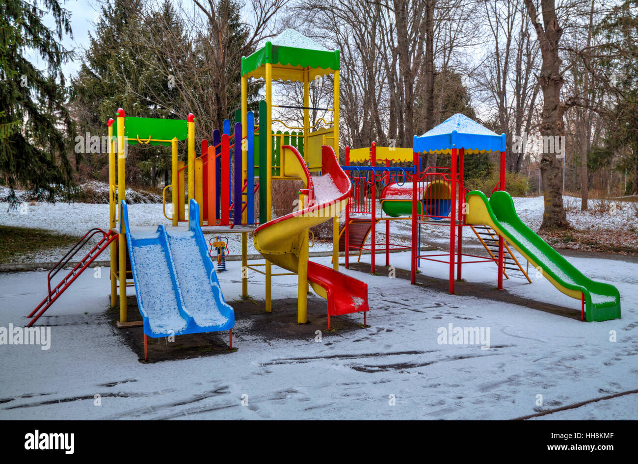 Children's playground covered with snow in winter Stock Photo - Alamy