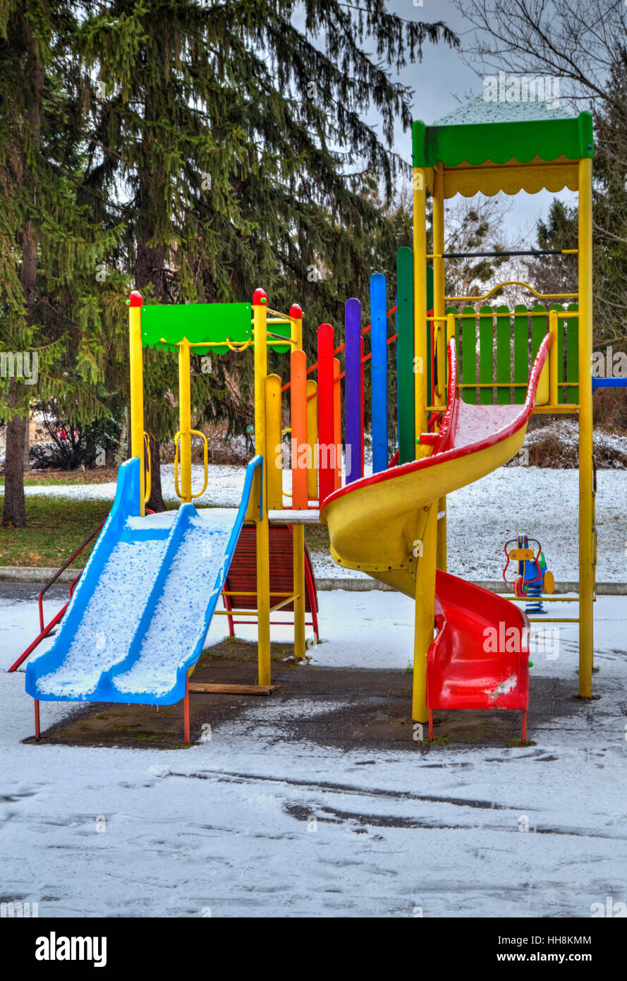 Children's playground covered with snow in winter Stock Photo - Alamy