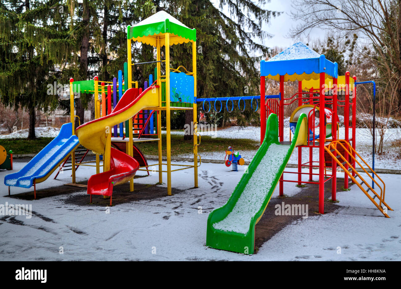 Children's playground covered with snow in winter Stock Photo - Alamy