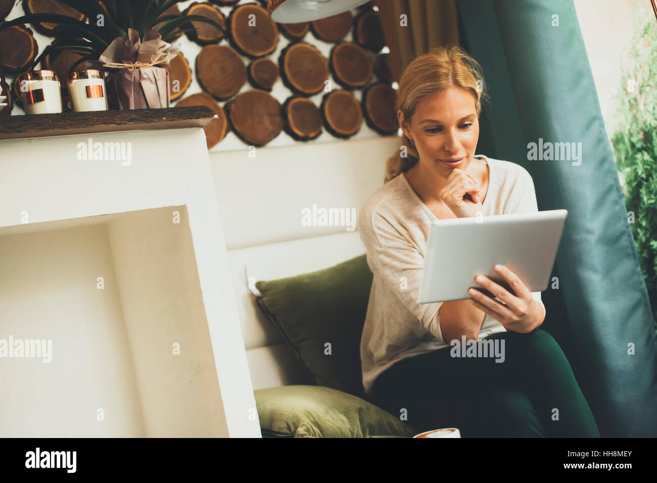 Woman in a cafe with tablet hi-res stock photography and images - Alamy
