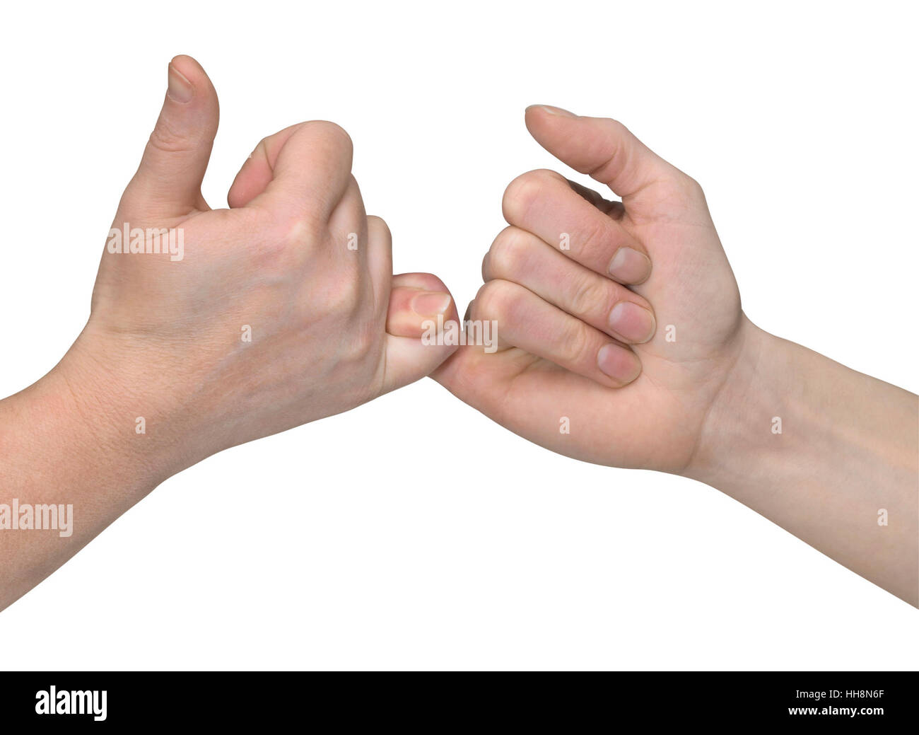 studio photography of two hands while wrestling with small finger, in white back Stock Photo
