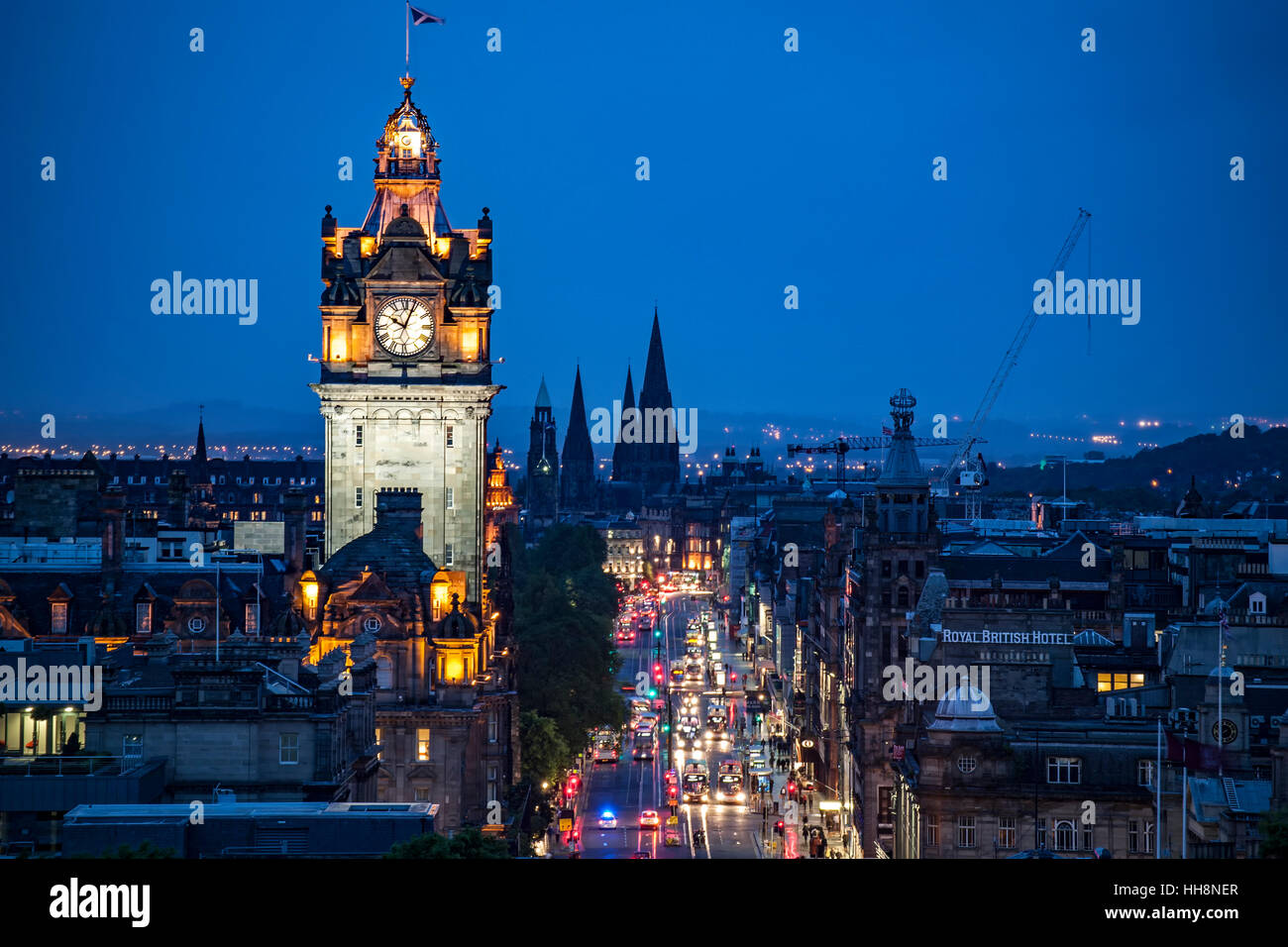 Balmoral Hotel Clock Tower and rain soaked Princes Street, Edinburgh, Scotland, United Kingdom Stock Photo