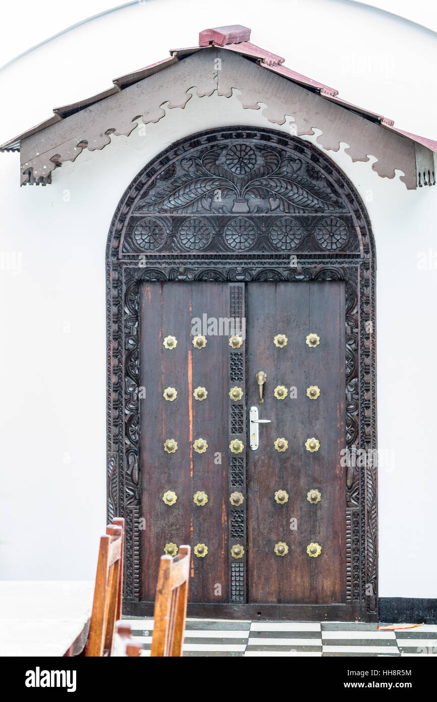 Stone town Typical Arabian door in Stonetown, Stone Town, Zanzibar, Tanzania, Africa Stock Photo