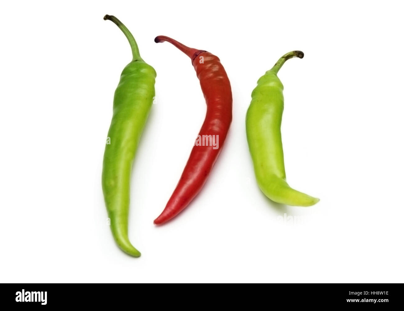 Red and green chili peppers isolated on white Stock Photo - Alamy
