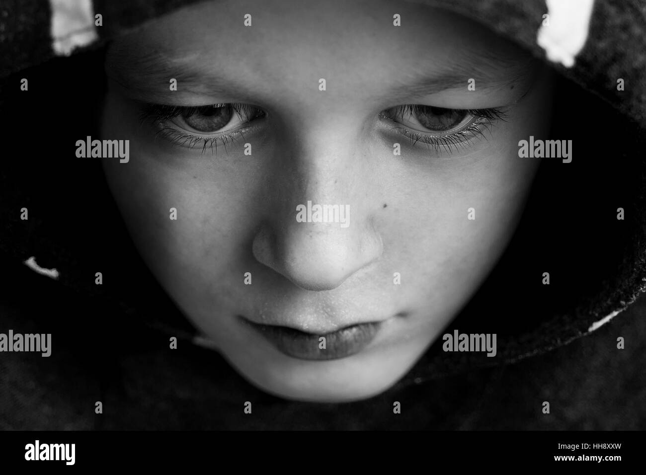 Sad Boy. Teenager with Sad Expression Face Close Up. Depression, Loneliness and Stress Concept. Stock Photo