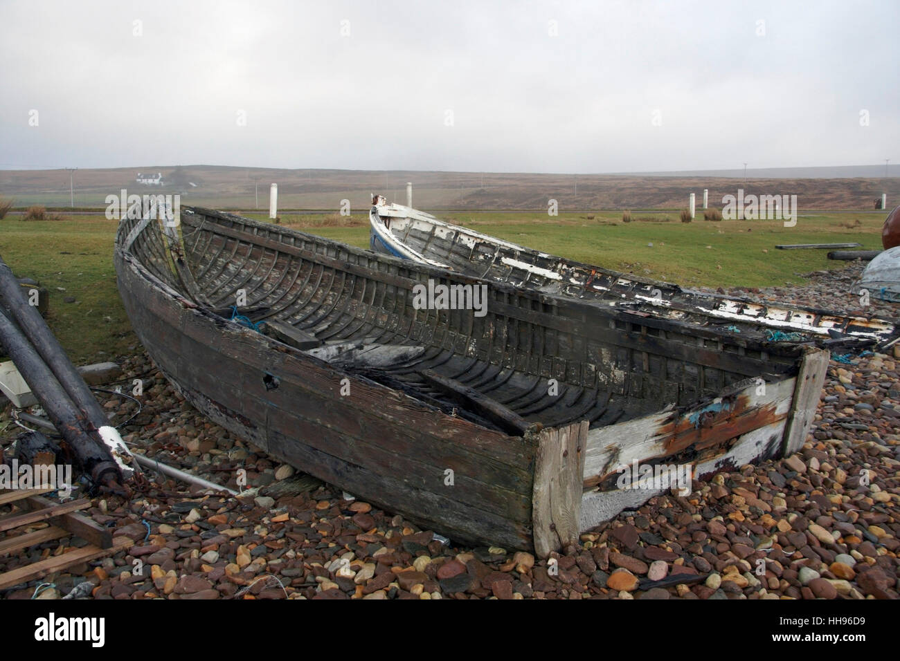 coastal landscape with rotten boats in Scotland Stock Photo