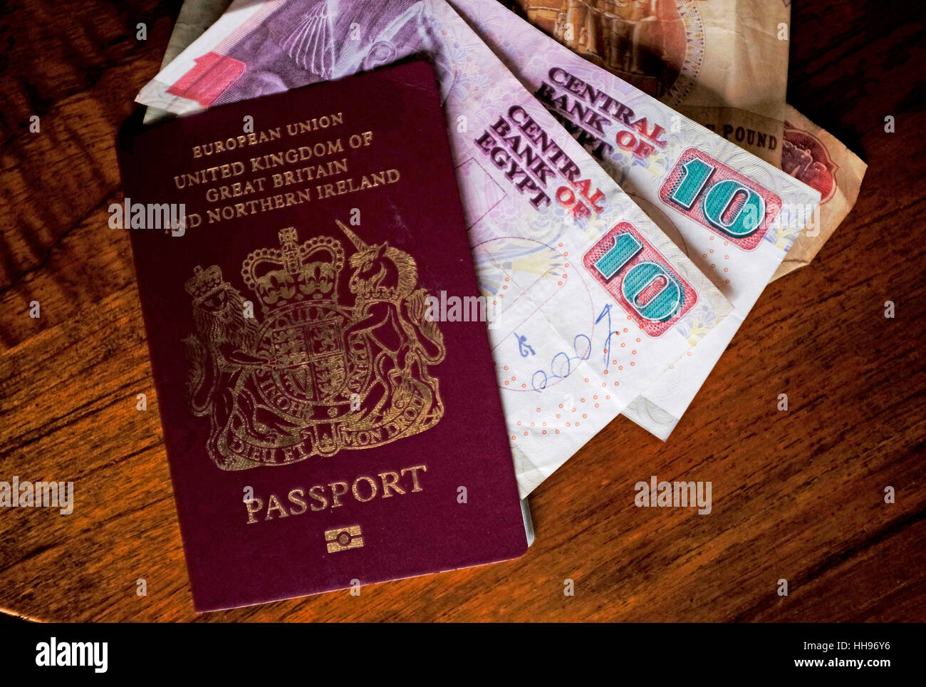 European Union British passport with Egyptian money notes from Central