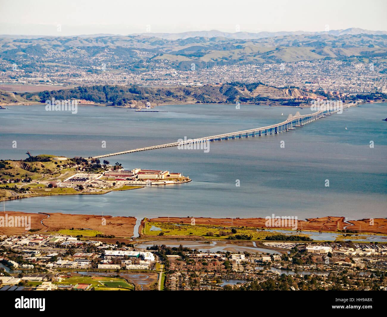 View across San Francisco Bay from Mt Tamalpais with Oakland in the distance, the Richmond Bridge and San Quentin Prison Stock Photo