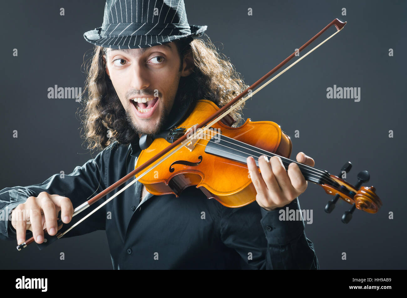Fiddler playing the violin Stock Photo Alamy