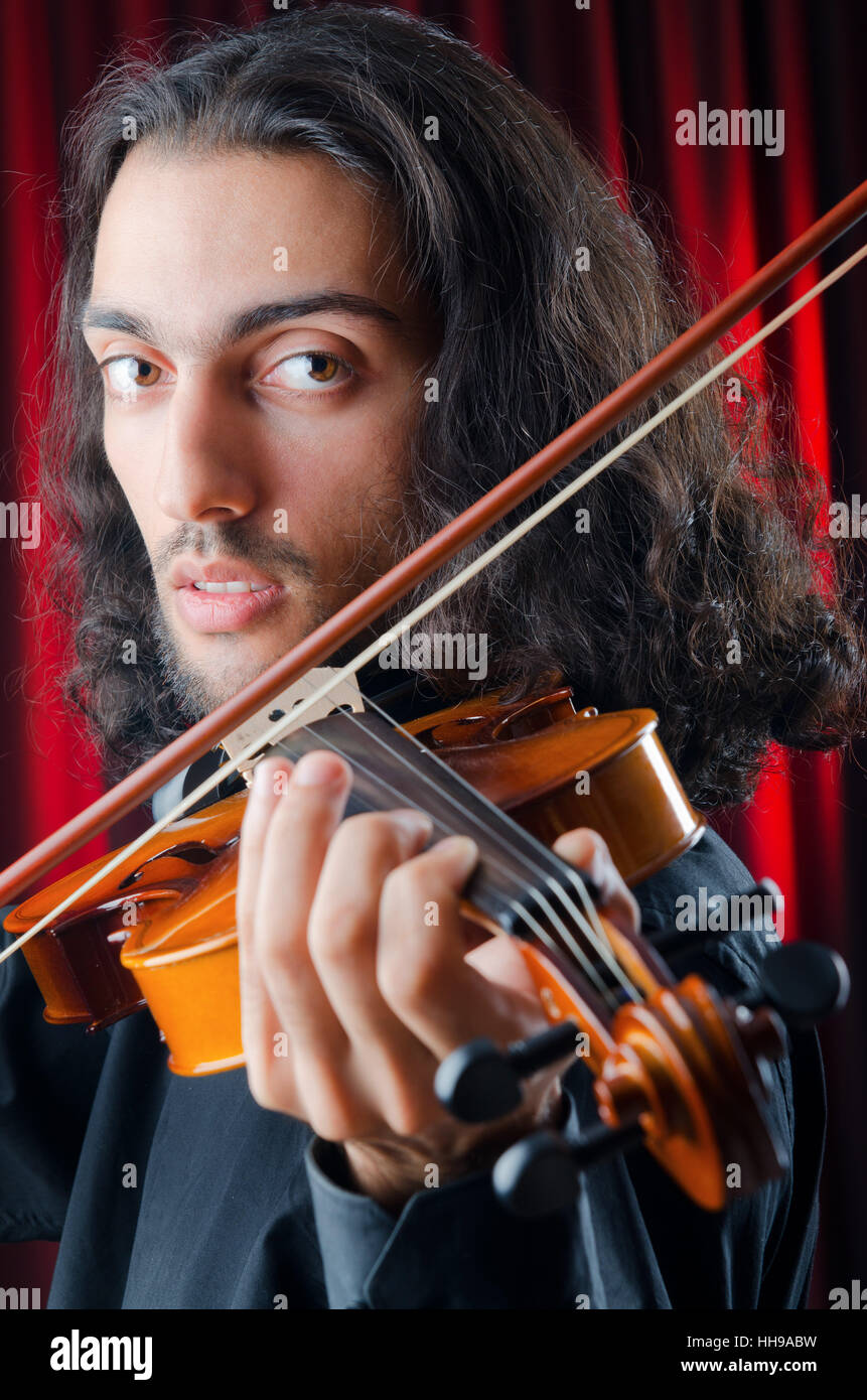 Violin player playing the intstrument Stock Photo Alamy