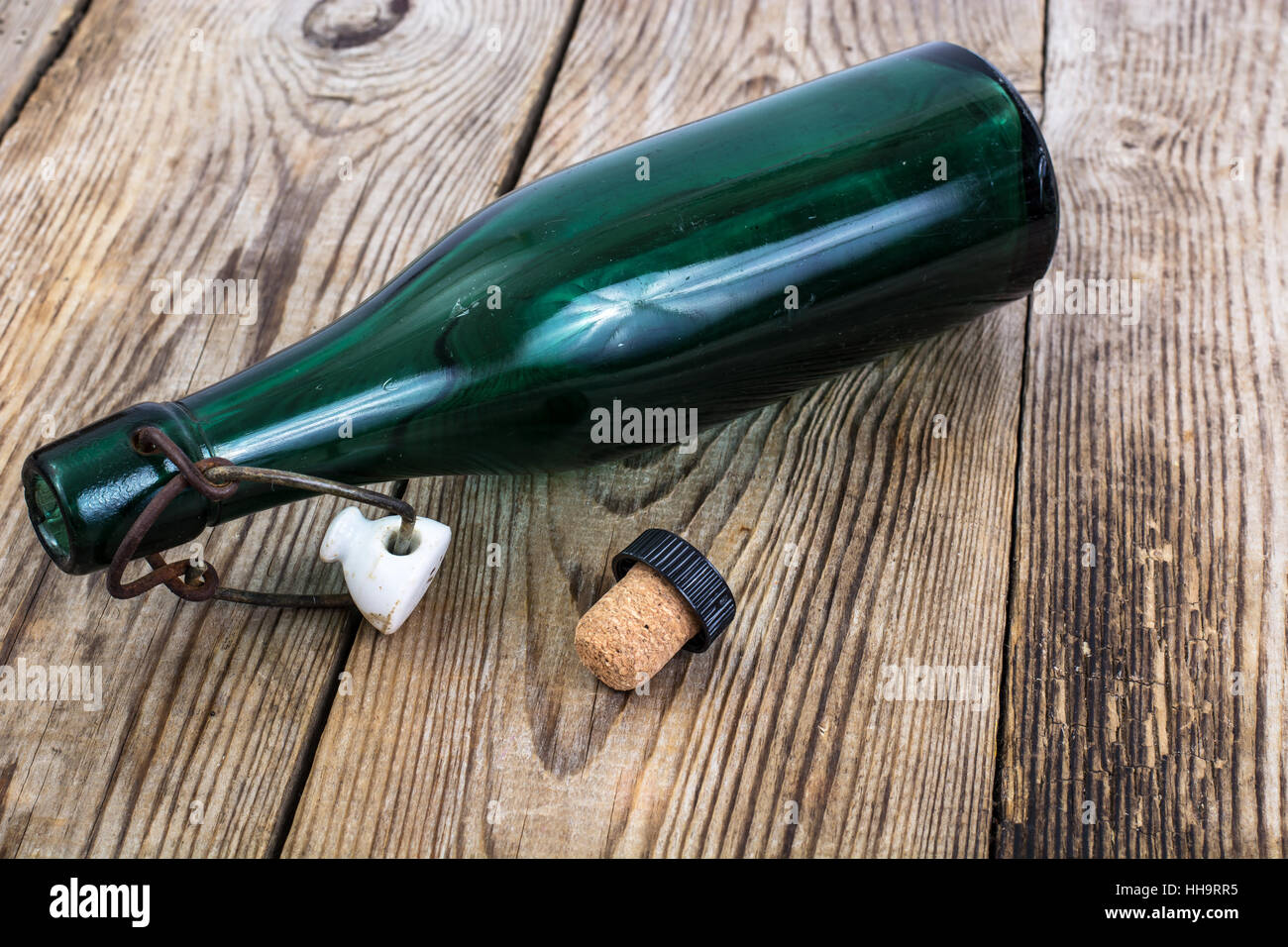 Old bottle of green glass Stock Photo - Alamy