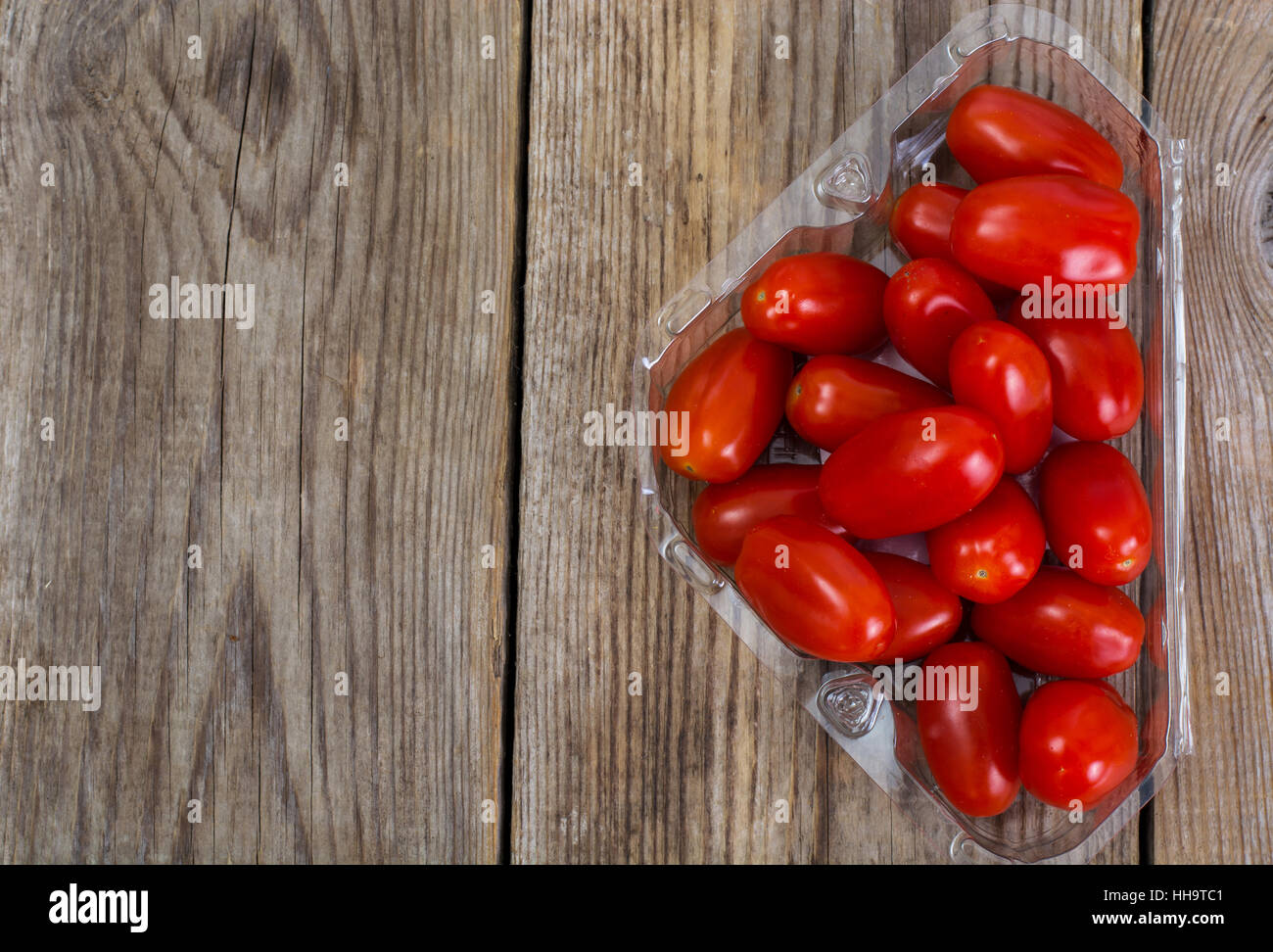 Small red oblong tomatoes Stock Photo