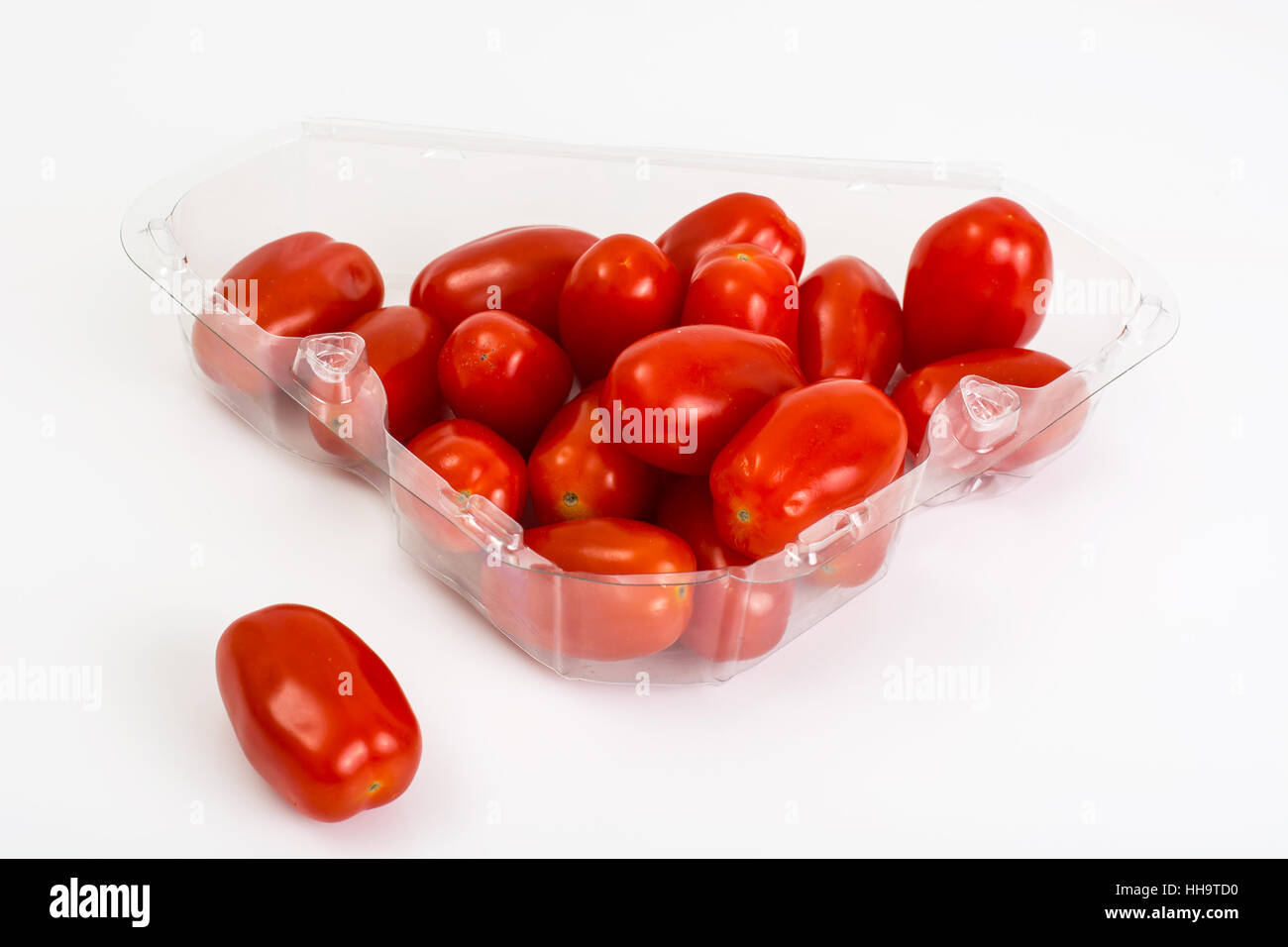 Small red oblong tomatoes Stock Photo