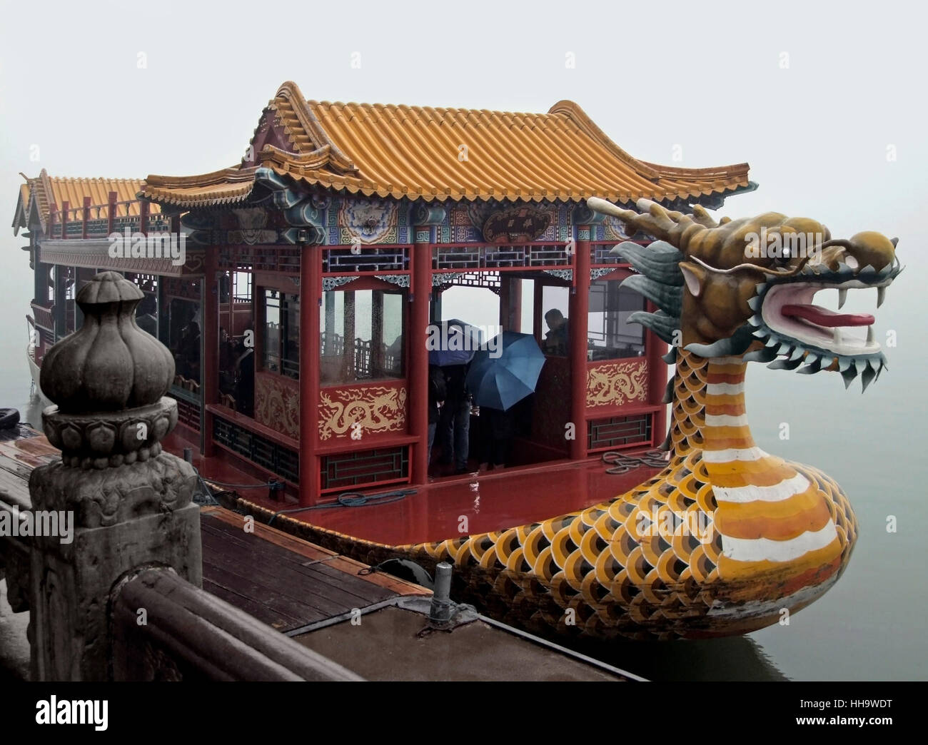 rainy scenery including a dragon-styled boat near Beijing in China Stock Photo