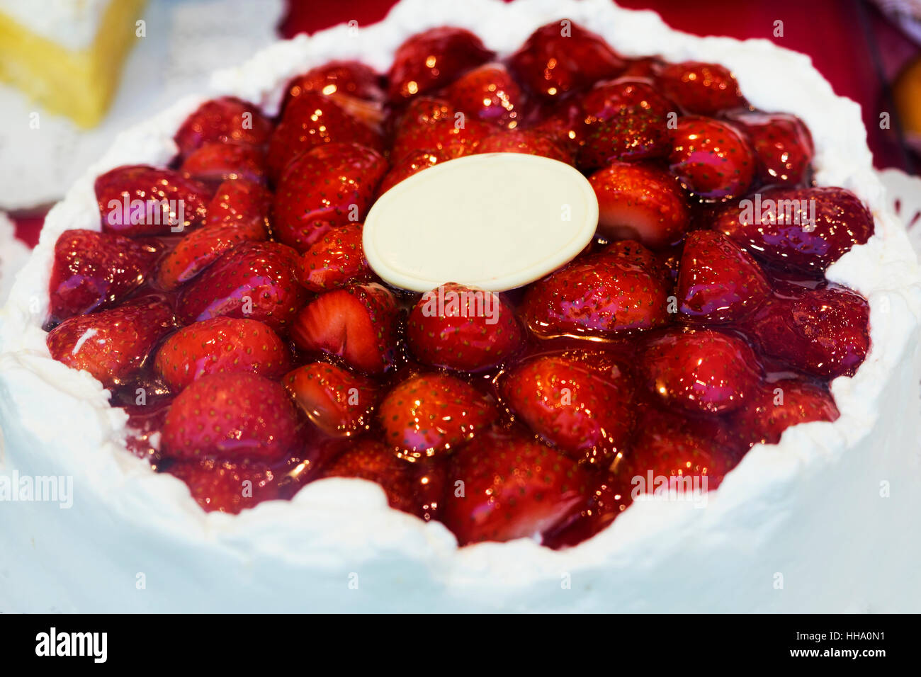Strawberry jam cake on top of cream milk Stock Photo Alamy