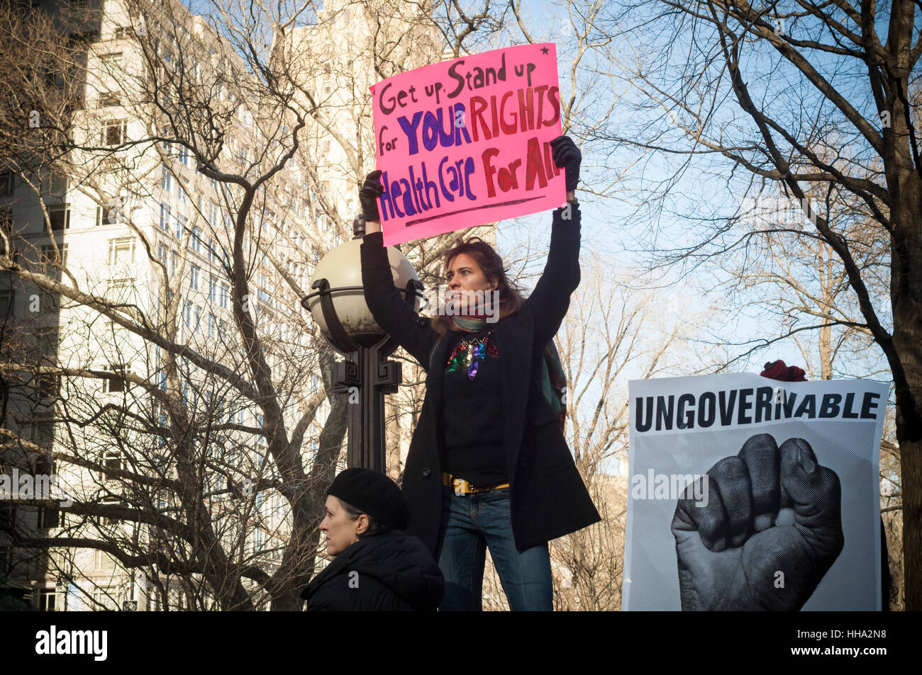 Hundreds of concerned New Yorkers protest in Columbus Circle in New York on Sunday, January 15, 2017 against president-elect Donald Trump and the discontinuance of the Affordable Care Act (Obamacare).  (© Richard B. Levine) Stock Photo