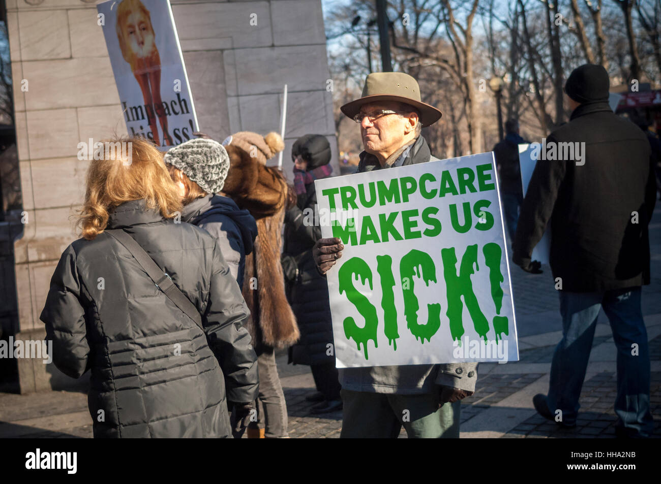 Hundreds of concerned New Yorkers protest in Columbus Circle in New York on Sunday, January 15, 2017 against president-elect Donald Trump and the discontinuance of the Affordable Care Act (Obamacare).  (© Richard B. Levine) Stock Photo