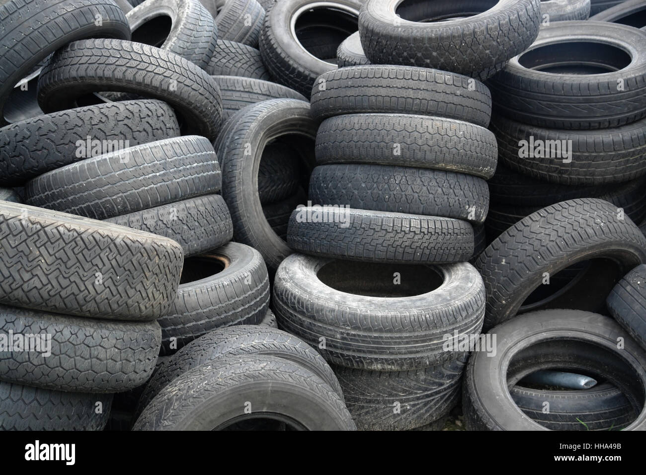 background with old tires on each other Stock Photo