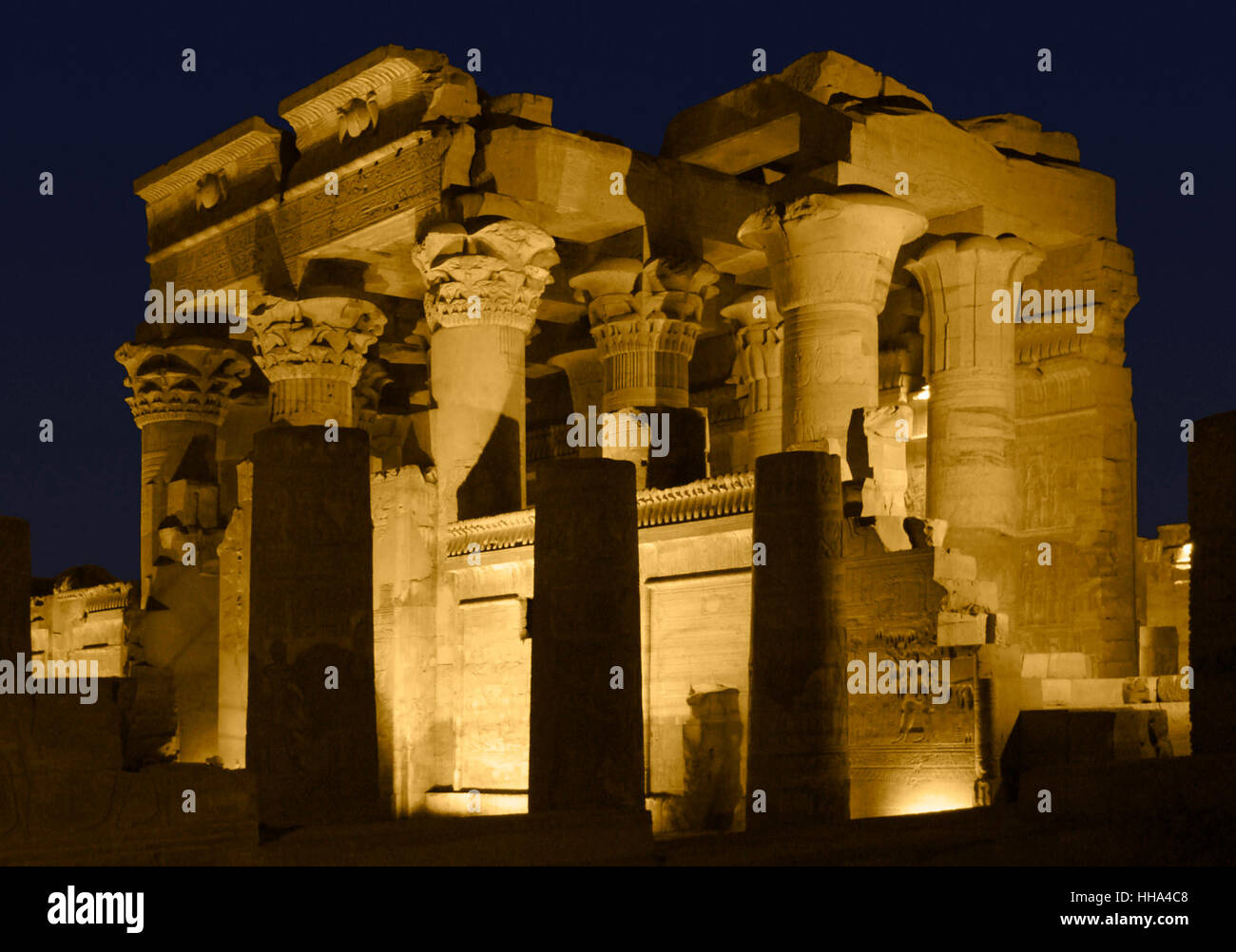ancient illuminated temple ruin in Egypt at night Stock Photo