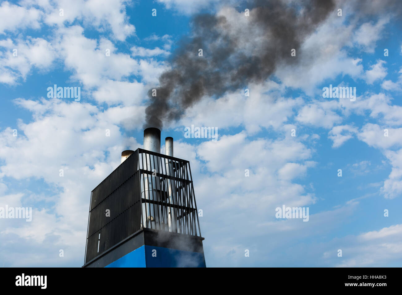 Aboard, chimney of a ferry or cruise ship, black smoke. Pollutes the ...