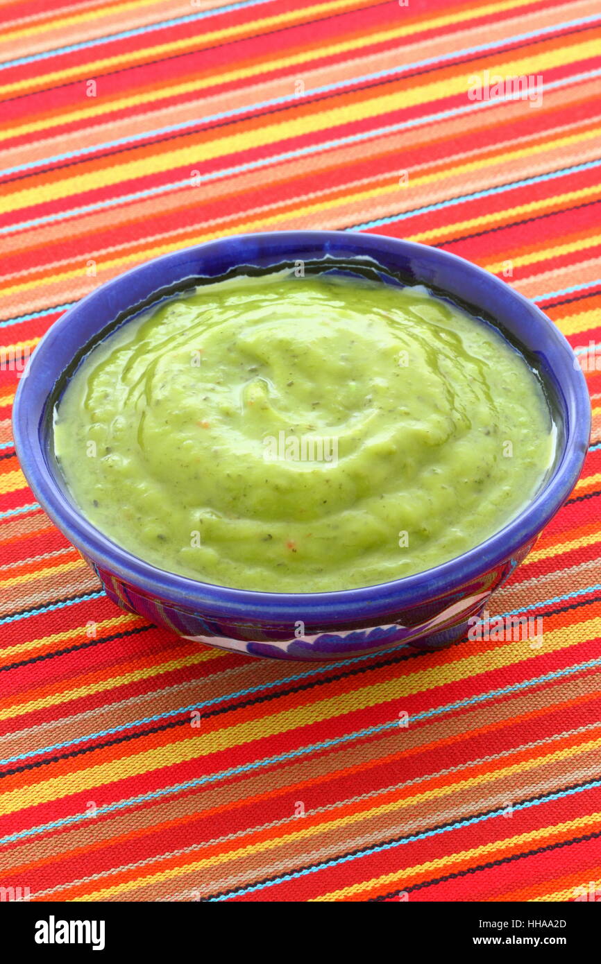 Mexican guacamole, prepared with fresh avocados, lemon juice, vinegar