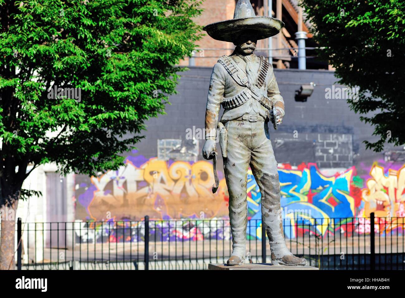 Statue of Emiliano Zapata in a park and plaza adjacent to Chicago's Benito Juarez High School. Chicago, Illinois, USA. Stock Photo