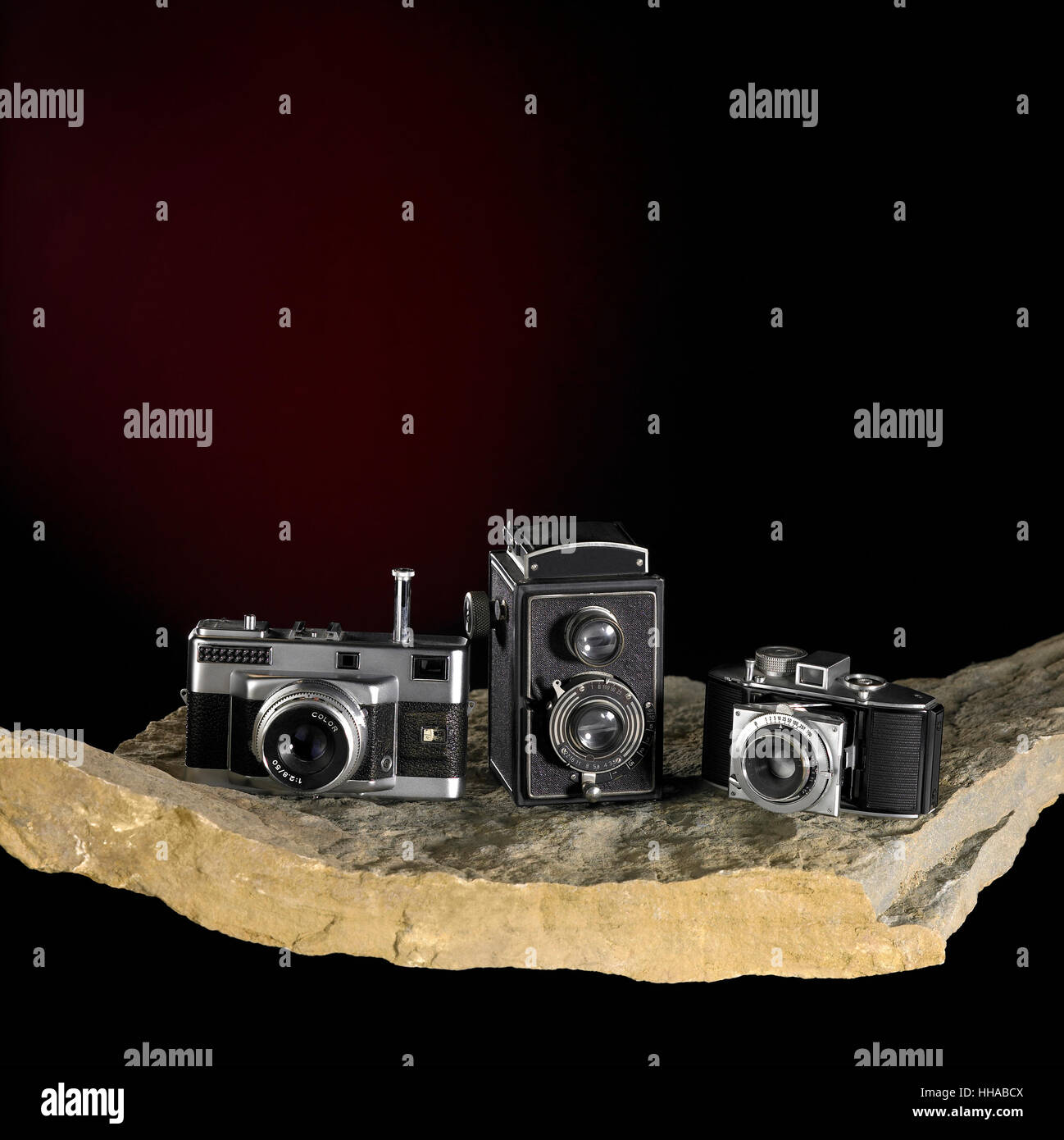 nostalgic cameras on stone surface Stock Photo