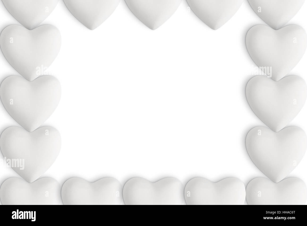 White love hearts with copy space in the centre on a white background
