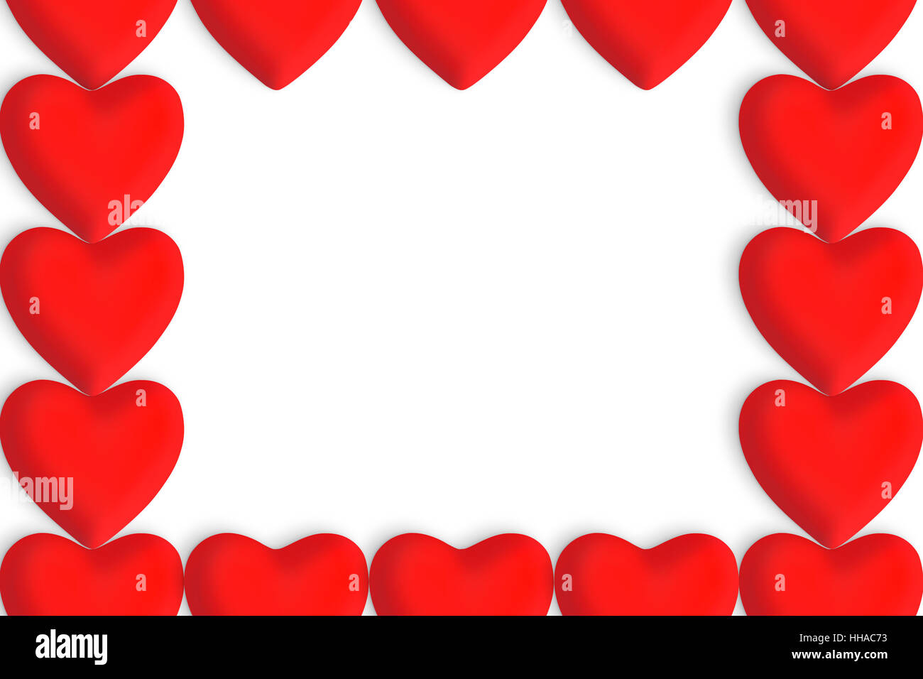 Red love hearts with copy space in the centre on a white background ...