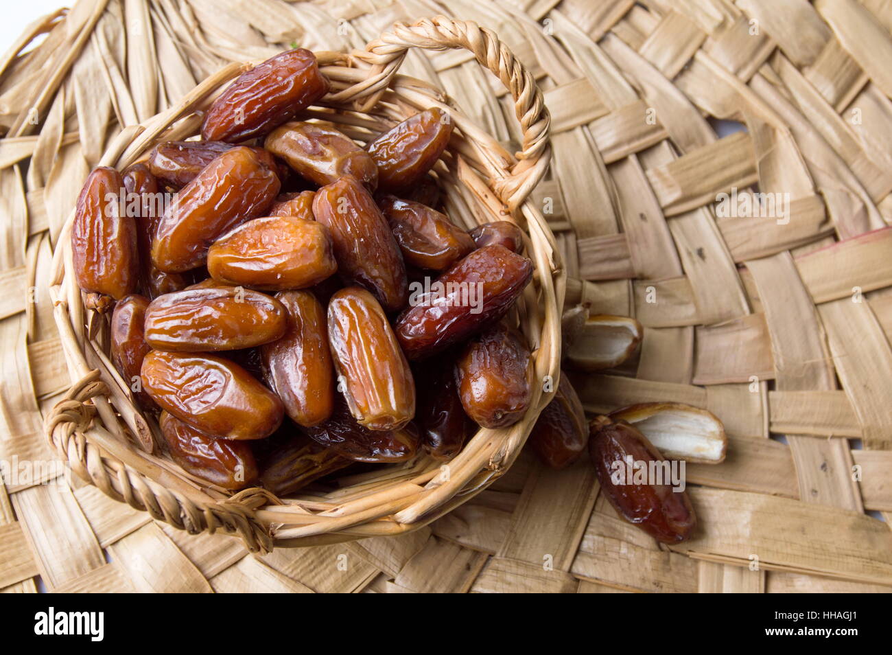 Bunch of dried date fruits in a bowl Stock Photo